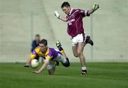 9 June 2001; Matty Forde of Wexford in a race for possession with David Mitchell of Westmeath during the Bank of Ireland All-Ireland Senior Football Championship Qualifier Round 1 match between Wexford and Westmeath at Wexford Park in Wexford. Photo by Brendan Moran/Sportsfile