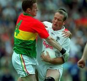 3 June 2001; Willie McCreery of Kildare is tackled by Val Fleming of Carlow during the Bank of Ireland Leinster Senior Football Championship Quarter-Final match between Kildare and Carlow at Croke Park in Dublin. Photo by David Maher/Sportsfile