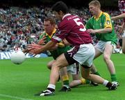 3 June 2001; Donal Curtis of Meath, supported by team-mate Richie Kealy, in action against Brian Morley of Westmeath during the Bank of Ireland Leinster Senior Football Championship Quarter-Final match between Meath and Westmeath at Croke Park in Dublin. Photo by Brian Lawless/Sportsfile