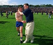 3 June 2001; Tipperary manager Nicky English consoles James O'Connor of Clare following the Guinness Munster Senior Hurling Championship Semi-Final match between Tipperary and Clare at Páirc Uí Chaoimh in Cork. Photo by Brendan Moran/Sportsfile