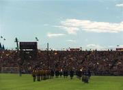 3 June 2001; Players of both sides during the pre-match parade ahead of the Guinness Munster Senior Hurling Championship Semi-Final match between Tipperary and Clare at Páirc Uí Chaoimh in Cork. Photo by Brendan Moran/Sportsfile