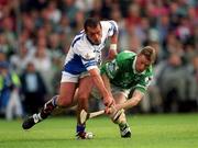 10 June 2001; Eoin O'Neill of Limerick in action against Peter Queally of Waterford during the Guinness Munster Senior Hurling Championship Semi-Final match between Limerick and Waterford at Páirc Uí Chaoimh in Cork. Photo by Brendan Moran/Sportsfile