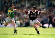 20 May 2001; Alan Kerins of Galway and Gareth Foley of Leitrim race for possession during the Bank of Ireland Connacht Senior Football Championship Quarter-Final match between Galway and Leitrim at Tuam Stadium in Tuam, Galway. Photo by Brendan Moran/Sportsfile