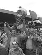 27 July 1980; Offaly captain Richie Connor lifts the cup following the Leinster Senior Football Championship Final match between Dublin and Offaly at Croke Park in Dublin. Photo by Ray McManus/Sportsfile