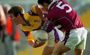 9 June 2001; Redmond Barry of Wexford in action against Brian Morley of Westmeath during the Bank of Ireland All-Ireland Senior Football Championship Qualifier Round 1 match between Wexford and Westmeath at Wexford Park in Wexford. Photo by Brendan Moran/Sportsfile