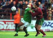 1 June 2001; Clinton Morrison of Republic of Ireland in action against Antonio Leonei Tonei of Portugal during the UEFA European Under-21 Championship Qualifier Group 2 match between Republic of Ireland and Portugal at Tolka Park in Dublin. Photo by Damien Eagers/Sportsfile
