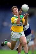 27 May 2001; Donnie Ryan of Offaly in action against Damien Ryan of Laois during the Bank of Ireland Leinster Senior Football Championship Quarter-Final match between Offaly and Laois at Croke Park in Dublin. Photo by Brendan Moran/Sportsfile