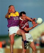 9 June 2001; Rory O'Connell of Westmeath in action against Willie Carley of Wexford during the Bank of Ireland All-Ireland Senior Football Championship Qualifier Round 1 match between Wexford and Westmeath at Wexford Park in Wexford. Photo by Brendan Moran/Sportsfile