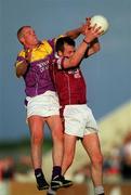 9 June 2001; Rory O'Connell of Westmeath in action against Willie Carley of Wexford during the Bank of Ireland All-Ireland Senior Football Championship Qualifier Round 1 match between Wexford and Westmeath at Wexford Park in Wexford. Photo by Brendan Moran/Sportsfile