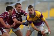 9 June 2001; Matty Forde of Wexford in action against John Keane, centre, and Brian Morley of Westmeath during the Bank of Ireland All-Ireland Senior Football Championship Qualifier Round 1 match between Wexford and Westmeath at Wexford Park in Wexford. Photo by Brendan Moran/Sportsfile