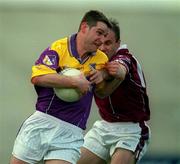 9 June 2001; Pat Forde of Wexford in action against Ger Heavin of Westmeath during the Bank of Ireland All-Ireland Senior Football Championship Qualifier Round 1 match between Wexford and Westmeath at Wexford Park in Wexford. Photo by Brendan Moran/Sportsfile