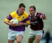 9 June 2001; Pat Forde of Wexford in action against Ger Heavin of Westmeath during the Bank of Ireland All-Ireland Senior Football Championship Qualifier Round 1 match between Wexford and Westmeath at Wexford Park in Wexford. Photo by Brendan Moran/Sportsfile