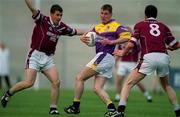 9 June 2001; Pat Forde of Wexford in action against Brian Morley and Rory O'Connell, 8, of Westmeath during the Bank of Ireland All-Ireland Senior Football Championship Qualifier Round 1 match between Wexford and Westmeath at Wexford Park in Wexford. Photo by Brendan Moran/Sportsfile