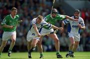 10 June 2001; Brian Flannery of Waterford in action against Brian Begley of Limerick during the Guinness Munster Senior Hurling Championship Semi-Final match between Limerick and Waterford at Páirc Uí Chaoimh in Cork. Photo by Brendan Moran/Sportsfile