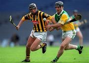 10 June 2001; Eddie Brennan of Kilkenny in action against Hubert Rigney of Offaly during the Guinness Leinster Senior Hurling Championship Semi-Final match between Kilkenny and Offaly at Croke Park in Dublin. Photo by Ray McManus/Sportsfile