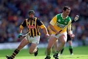 10 June 2001; Kevin Kinahan of Offaly in action against DJ Carey of Kilkenny during the Guinness Leinster Senior Hurling Championship Semi-Final match between Kilkenny and Offaly at Croke Park in Dublin. Photo by Ray McManus/Sportsfile