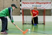 21 April 2016; Cork camogie legend Anna Geary tries her hand at floorball at a Special Olympics Winter Sports event in Dublin. Anna and the Women’s Gaelic Players Association have thrown their support behind Special Olympics on their charity Collecion Day, which is proudly sponsored by eir. Collection Day takes place nationwide on Friday the 22nd of April. 3,000 volunteers, including many WGPA players and eir employees, will be out in force in villages, towns and cities around Ireland trying to help the sports charity raise €650,000 in just 24 hours. Pictured with Anna Geary is Connacht Special Olympic athlete Aine Naughton. Kilternan Ski Slope & Loughlinstown Activity Centre, Kilternan, Dublin. Picture credit: Sam Barnes / SPORTSFILE