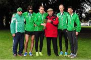 17 April 2016; Paddy Noonan, left, and  Patrick Boland, centre, with the winners of the Senior Men's relay race, from left, Mick Clohisey, Kieran Kelly, Mark Kirwan and Daire Bermingham, Raheny Shamrock AC, Dublin. The GloHealth AAI National Road Relays. Raheny, Dublin. Picture credit : Tomás Greally /  SPORTSFILE