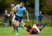 23 April 2016; Barry Daly, UCD, breaks the tackle of Bryan Byrne, Clontarf. Ulster Bank League, Division 1A, semi-final, Clontarf v UCD. Castle Avenue, Clontarf, Co. Dublin. Picture credit: Cody Glenn / SPORTSFILE