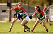 23 April 2016; Patrice Dennehy, Kerry, is tackled by Clodagh McManamon, left, and Doireann Hughes, Mayo. Lidl Ladies Football National League, Division 1, semi-final, Mayo v Kerry. St Brendan's Park, Birr, Co. Offaly. Picture credit: Ramsey Cardy / SPORTSFILE