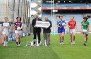 4 May 2010; Captain’s from teams competing in the Bord Gáis Energy NFL Divisions finals gathered in Croke Park ahead of the finals Park in Parnell Park on Saturday. Pictured are, from left to right, Kildare's Aisling Holton, Galway's Emer Flaherty, Cavan's Pamela Crowe, Cork's Rena Buckley and Donegal's Aoife McDonald with Ger Cunningham, Bord Gáis Energy Sport Sponsorship Manager, and Ladies Gaelic Football Association President Pat Quill, right. Croke Park, Dublin. Photo by Sportsfile E