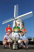 4 May 2010; At the launch of the 2010 GAA Football All-Ireland Senior Championship at Blennerville Windmill are, back, from left, Michael Shields, Cork, Micheal Quirke, Kerry, and Trevor Mortimer, Mayo, with, front, Stephen O'Neill, Tyrone, left, and Alan Brogan, Dublin. Blennerville, Co. Kerry. Picture credit: Brendan Moran / SPORTSFILE