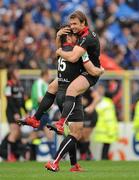 1 May 2010; Toulouse players Clement Poitrenaud, 15, and Vincent Clerc, celebrate at the final whistle. Heineken Cup Semi-Final, Toulouse v Leinster, Le Stadium Municipal, Toulouse, France. Picture credit: Brendan Moran / SPORTSFILE