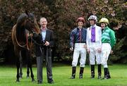 6 May 2010; Retired top flat jockey Michael Kinane with race horse Haralan and jockeys, from left to right, Fran Berry, Kevin Manning and Pat Smullen after he was announced as Horse Racing Ireland's flat ambassador for 2010. John Oxx’s Curraghbeg Yard, Curragh, Co. Kildare. Picture credit: Matt Browne / SPORTSFILE