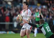 7 May 2010; Ian Whitten, Ulster, goes past the tackle of Gavin Duffy, Connacht, on his way to scoring his side's fourth try. Celtic League, Ulster v Connacht, Ravenhill Park, Belfast, Co. Antrim. Picture credit: Oliver McVeigh / SPORTSFILE