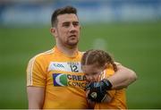23 April 2016; Antrim's Conor Murray with his daughter Roma, age 4, after the game. Allianz Football League, Division 4, Final, Louth v Antrim. Croke Park, Dublin. Picture credit: Piaras Ó Mídheach / SPORTSFILE