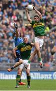 24 April 2016; Bryan Sheehan, Kerry, rises highest to beat team-mate Kieran Donaghy and Denis Bastick, Dublin to the ball. Allianz Football League Division 1 Final, Dublin v Kerry. Croke Park, Dublin.  Picture credit: Ramsey Cardy / SPORTSFILE