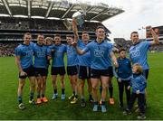 24 April 2016; Dublin players, from left, Dean Rock, Denis Bastick, with son Aiden, Diarmuid Connolly, Cormac Costello, Paul Flynn, Brian Fenton and Darren Daly, with the cup following their side's victory over Kerry. Allianz Football League, Division 1, Final, Dublin v Kerry. Croke Park, Dublin. Picture credit: Ramsey Cardy / SPORTSFILE