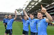 24 April 2016; Dublin players, from left, Denis Bastick, holding his son Aiden, Cormac Costello, Diarmuid Connolly and Paul Flynn celebrate after the game. Allianz Football League Division 1 Final, Dublin v Kerry. Croke Park, Dublin. Picture credit: Dean Cullen / SPORTSFILE