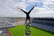 13 May 2010; 3, doing things you never thought possible. -  World-famous balancing artist performs an impossible feat of daring on the roof of Croke Park for 3. 3, Ireland’s largest high speed network, has brought world-famous balancing artist, Eskil Ronningsbakken, to Ireland for the first time today to celebrate its new brand campaign. A breathtaking feat of skill, featuring Eskil precariously perched on top of the iconic Croke Park Stadium, highlights the new brand campaign and its key message ‘Do things you never thought possible with 3’. To coincide with today’s performance, Croke Park has announced that it will soon be possible for members of the public to ‘do things they never thought possible’ by scaling the stadium to take a walking tour of the roof, providing spectacular views across the city. To mark the launch, 3 is giving 33 lucky people the chance to ‘do something they never thought possible’, by being among the first to follow in the stunt-man’s footsteps. To be in with a chance to win tickets to the Croke Park Roof Top tour when it opens later this year, simply log on to www.three.ie, for details of how to enter. Croke Park, Dublin. Picture credit: William Pran / SPORTSFILE