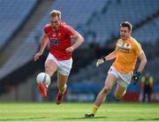23 April 2016; Conor Grimes, Louth, runs past Antrim's Mark Sweeney on his way to scoring a goal in the 71st minute. Allianz Football League, Division 4, Final, Louth v Antrim. Croke Park, Dublin. Picture credit: Ray McManus / SPORTSFILE