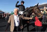 26 April 2016; Barry O'Neill celebrates with owners Brendan Keogh as they enter the winner's enclosure after winning the Goffs Land Rover Bumper with Coeur De Lion. Punchestown, Co. Kildare. Picture credit: Seb Daly / SPORTSFILE