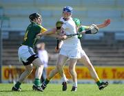 8 May 2010; David Harney, Kildare, in action against David Donoghue, left, and Michael Foley, Meath. Christy Ring Cup, Round 1, Meath v Kildare, Pairc Tailteann, Navan, Co. Meath. Picture credit: Ray McManus / SPORTSFILE