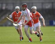 15 May 2010; Conor Grogan, Tyrone, in action against Nathan Curry and Cathal Carvill, Armagh. Ulster GAA Hurling Senior Championship Second Round, Armagh v Tyrone, Casement Park, Belfast. Picture credit: Oliver McVeigh / SPORTSFILE