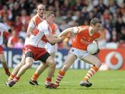 16 May 2010; Brendan Donaghy, Armagh, in action against Declan Mullan, Derry. Ulster GAA Football Senior Championship - Preliminary Round, Derry v Armagh, Celtic Park, Derry. Picture credit: Oliver McVeigh / SPORTSFILE