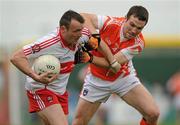 16 May 2010; Paddy Bradley, Derry, in action against Brendan Donaghy, Armagh. Ulster GAA Football Senior Championship - Preliminary Round, Derry v Armagh, Celtic Park, Derry. Photo by Sportsfile
