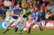 16 May 2010; Colm Cooper, Kerry, in action against Niall Curran, left, and Paddy Codd, Tipperary. Munster GAA Football Senior Championship Quarter-Final, Kerry v Tipperary, Semple Stadium, Thurles, Co. Tipperary. Picture credit: Stephen McCarthy / SPORTSFILE