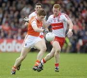 16 May 2010; Charlie Vernon, Armagh, in action against Fergal Doherty, Derry. Ulster GAA Football Senior Championship - Preliminary Round, Derry v Armagh, Celtic Park, Derry. Picture credit: Oliver McVeigh / SPORTSFILE