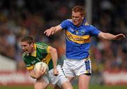 16 May 2010; Killian Young, Kerry, in action against George Hannigan, Tipperary. Munster GAA Football Senior Championship Quarter-Final, Kerry v Tipperary, Semple Stadium, Thurles, Co. Tipperary. Picture credit: Stephen McCarthy / SPORTSFILE