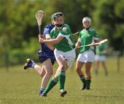 16 May 2010; Katie Power, Leinster, in action against Fiona Lafferty, Munster. 2010 Gael Linn Senior Inter-Provincial Championship Camogie Final, Munster v Leinster, Trim GAA Club, Trim, Co. Meath. Picture credit: Barry Cregg / SPORTSFILE