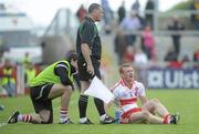 16 May 2010; Fergal Doherty, Derry, on the ground with a second half injury. Ulster GAA Football Senior Championship - Preliminary Round, Derry v Armagh, Celtic Park, Derry. Picture credit: Oliver McVeigh / SPORTSFILE