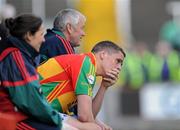 16 May 2010; Carlow's Brendan Murphy sits on the side line after he was sent off by referee Gearoid O Conamha. Leinster GAA Football Senior Championship Preliminary Round, Wicklow v Carlow, O'Moore Park, Portlaoise, Co. Laoise. Picture credit: Matt Browne / SPORTSFILE
