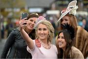 27 April 2016; Ladies day winner Audrey Kelly, from Naas, Co. Kildare, with judges, from left, Deanna O'Connor, from Xpose magazine, Rachel Carberry, and 2FM DJ Lottie Ryan. Punchestown, Co. Kildare. Picture credit: Matt Browne / SPORTSFILE