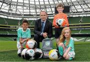 28 April 2016; Republic of Ireland manager Martin O’Neill was on hand at the Aviva Stadium today to launch the 2016 SportsDirect.com FAI Summer Soccer Schools programme. The SportsDirect.com Summer Soccer Schools programme is the FAI’s largest grass roots programme and one of the most important as it encourages children’s involvement in sport, in a fun and friendly environment. Camps begin on July 4th and run right through to August 28th and are priced at €65. Pictured at the launch are, from left to right, Braydon Roche, Republic of Ireland manager Martin O’Neill, Benjamin Lynch and Sadhbh McKane. Aviva Stadium, Lansdowne Road, Dublin. Picture credit: Seb Daly / SPORTSFILE