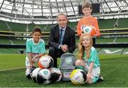 28 April 2016; Republic of Ireland manager Martin O’Neill was on hand at the Aviva Stadium today to launch the 2016 SportsDirect.com FAI Summer Soccer Schools programme. The SportsDirect.com Summer Soccer Schools programme is the FAI’s largest grass roots programme and one of the most important as it encourages children’s involvement in sport, in a fun and friendly environment. Camps begin on July 4th and run right through to August 28th and are priced at €65.. Pictured at the launch are, from left to right, Braydon Roche, Republic of Ireland manager Martin O’Neill, Benjamin Lynch and Sadhbh McKane. Aviva Stadium, Lansdowne Road, Dublin. Picture credit: Seb Daly / SPORTSFILE