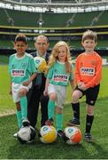 28 April 2016; Republic of Ireland manager Martin O’Neill was on hand at the Aviva Stadium today to launch the 2016 SportsDirect.com FAI Summer Soccer Schools programme. The SportsDirect.com Summer Soccer Schools programme is the FAI’s largest grass roots programme and one of the most important as it encourages children’s involvement in sport, in a fun and friendly environment. Camps begin on July 4th and run right through to August 28th and are priced at €65. Pictured at the launch are, from left to right, Braydon Roche, Republic of Ireland manager Martin O’Neill, Benjamin Lynch and Sadhbh McKane. Aviva Stadium, Lansdowne Road, Dublin. Picture credit: Seb Daly / SPORTSFILE